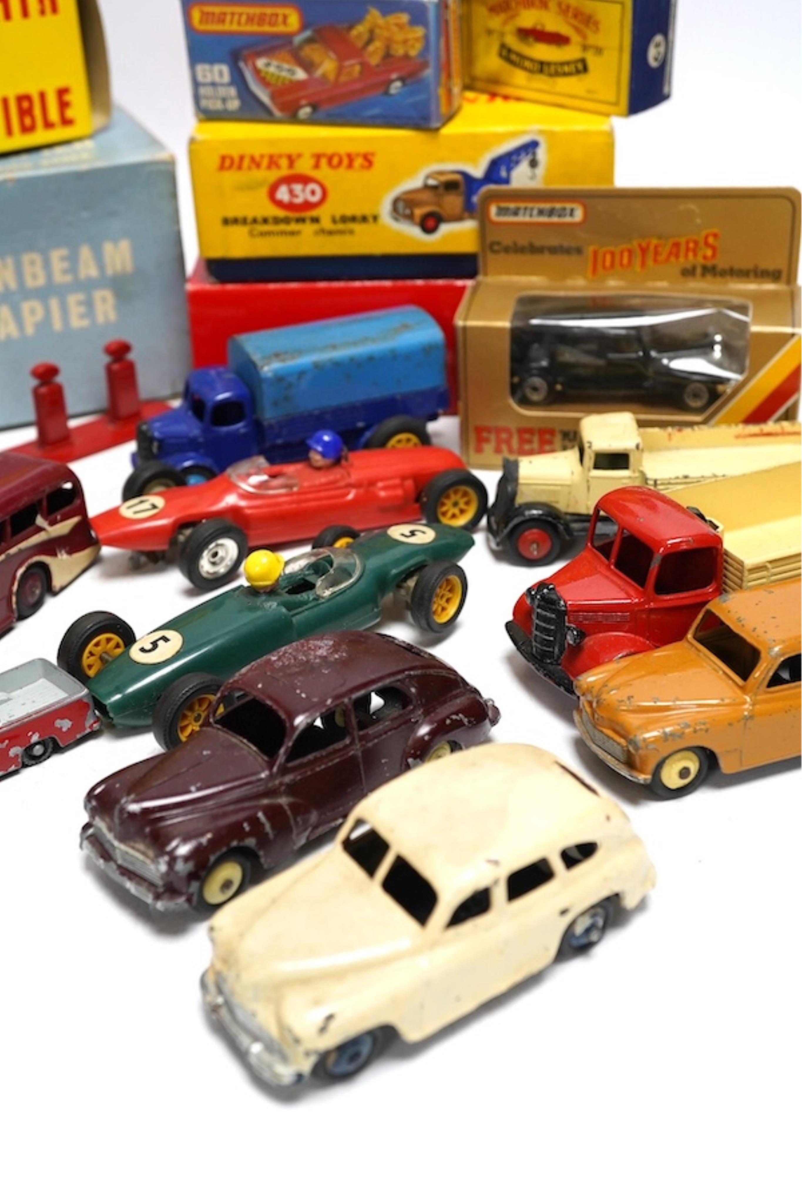 A quantity of diecast vehicles and a few useful boxes including; a boxed Clifford Series Ford Zephyr convertible, two boxed Replicar series Ford Zephyr convertibles, ten unboxed Dinky Toys, two Scalextric Formula One car